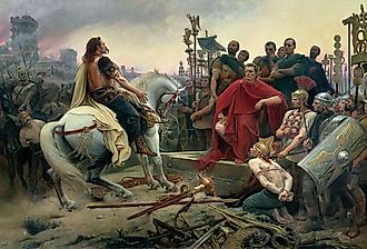 Vercingetorix surrenders to Julius Caesar following the Battle of Alesia in 52 BCE, as imagined by Lionel Royer in 1899. Image credit Lionel Royer, Public domain, via Wikimedia Commons
