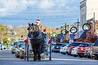 Horse-drawn carriage traveling on Main Street in beautiful Prattville, Alabama. Editorial credit: JNix / Shutterstock.com.
