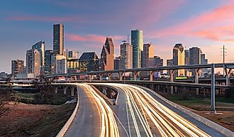Houston, Texas, USA downtown skyline over the highways at dusk.
