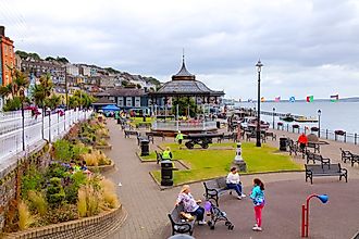  People visit the waterfront Kennedy Park in Cobh, Ireland. Image credit: Tupungato / Shutterstock.com.