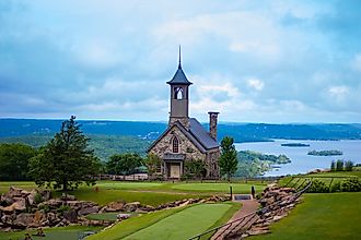 The Chapel of the Ozarks in the foreground at Top of the Rock in Branson, Missouri, with Table Rock Lake in the background