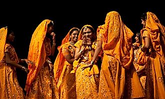 Indian folk dancers in the traditional lehenga-choli costume.