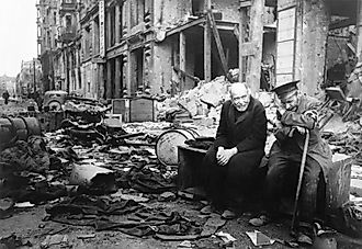 Two aged men lamenting on the destruction of Berlin.