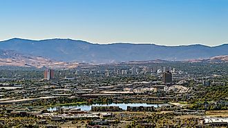 Reno-Sparks cityscape as seen from the East looking West with hotels, casinos and many other businesses and industry on a hazy autumn day. Editorial credit: Gchapel / Shutterstock.com