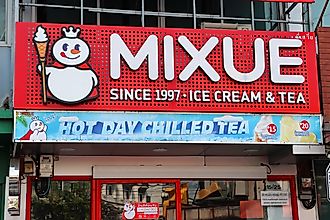 Mixue ice cream and tea cafe signage. Editorial credit: Opasbbb / Shutterstock.com