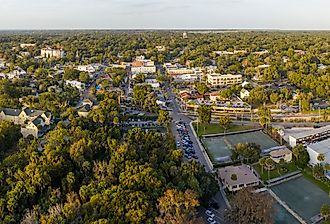 Drone shot of downtown Mount Dora, FL with some changing leaves.