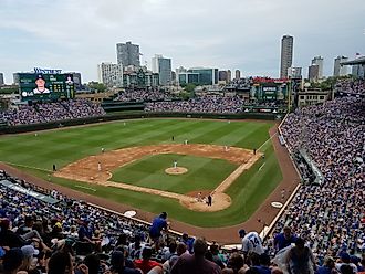 Chicago Cubs fans watching a Chicago Cubs baseball game at Wrigley Field. 
