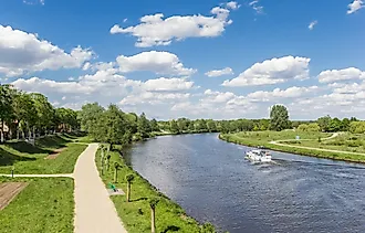 Bicycle path along the river Ems in Haren, Germany.