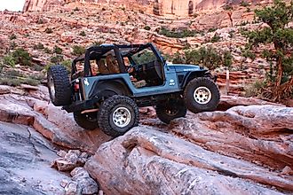Moab, Utah, USA, September 17,2018:Black Rubicon Jeep on Moab Rim 4x4 off road Jeep trail. Editorial credit: Ogletree Photography / Shutterstock.com