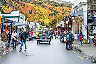 People can seen exploring around the Arrowtown during the Arrowtown Autumn Festival on Buckingham Street. Editorial credit: gracethang2 / Shutterstock.com