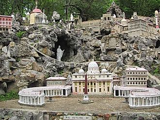 Miniature reproductions of religious structures worldwide, created by a local monk, adorn Ave Maria Grotto in Cullman, Alabama.