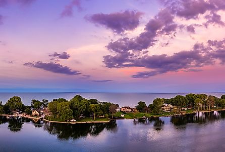Aerial panorama of the Cedar Point peninsula at dusk, in Sandusky, Ohio, on Lake Erie.