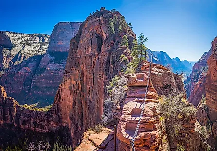 View from the narrow trail of Angel's Landing, the precipitous rocky ridge high above the canyon floor in Zion National Park, Utah, USA.