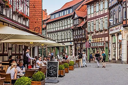 Street with a restaurant in old town Wernigerode, Germany.