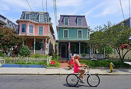 View of colorful historic Victorian houses in Cape May, New Jersey. Image credit EQRoy via Shutterstock