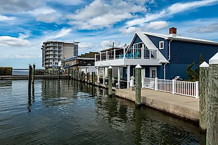 Waterfront buildings in Crisfield, Maryland. Image credit: Alexanderstock23 via Shutterstock.