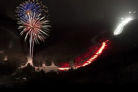 Fireworks over Stowe Mountain Resort, Stowe, Vermont, USA.  Via Shutterstock / Don Landwehrle.
