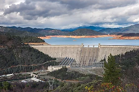 Shasta Dam is a concrete arch-gravity dam across the Sacramento River in Northern California
