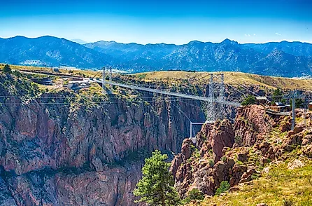 Royal gorge canyon and the associate suspension bridge draw tourists to Colorado. 