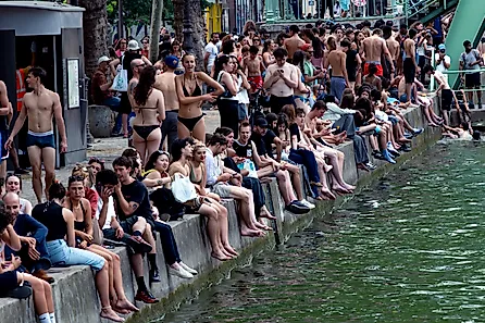 Parisians swim in the Saint Martin canal on a sweltering day