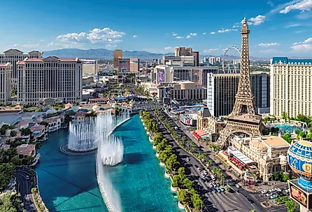 Aerial view of fountain show and Las Vegas strip in Nevada at sunset.