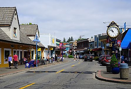 Downtown Poulsbo, Washington Front Street with clock in summer. Image credit Ian Dewar Photography via Shutterstock