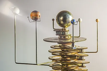 An orrery simulates the motions of the planets. Via Shutterstock / Pavel Diachenko