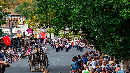 Crowds gather to see the annual Maldon Easter Procession in Maldon, Victoria, Australia. Image credit: lurchman / Shutterstock.com.