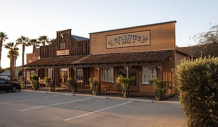 View of the Grange Hall and the Livery room at the Palm Canyon Hotel and RV Resort at Borrego Springs, California, via Rosamar / Shutterstock.com