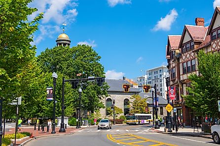 Historic Adams Building at 1354 Hancock Street with United First Parish Church in historic city center of Quincy, Massachusetts. Editorial credit: Wangkun Jia / Shutterstock.com