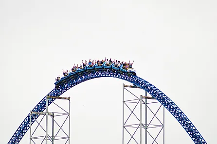 The train of Millennium Force crests a hill at Cedar Point in Sandusky, Ohio. Via Shutterstock / CJDPhotos