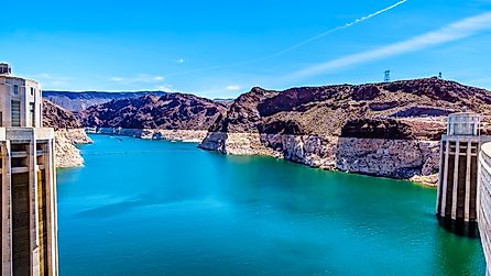 Low water level in Lake Mead and two Intake Towers that supply the water from Lake Mead to the Powerplant Turbines of the Hoover Dam hydroelectric power station 