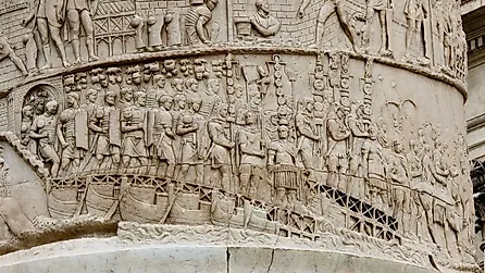 Detailed stone relief on Trajan's Column shows Roman soldiers during a military campaign. Image credit: History Skills / Shutterstock.com.