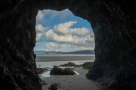 Pacific Northwest Beach Viewed from Inside Sea Cave in Olympic National Park. 