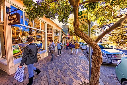People shopping on the main street in Carmel, California via oliver de la haye / iStock.com
