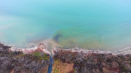 Water pollution entering Lake Erie via steel mills.