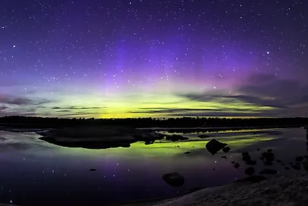 The northern lights shining over the waters of Voyageurs National Park from the Ash River Visitor Center, Minnesota. 