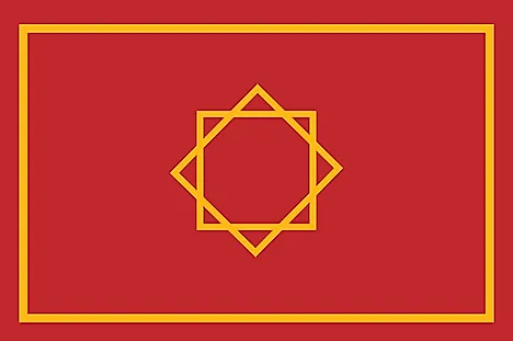 Red field with a large gold rectangle near and two overlapping squares in the middle