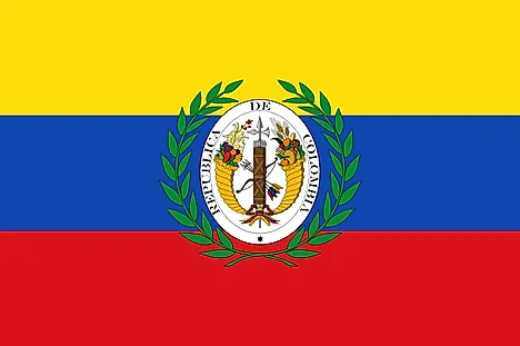 Yellow, blue, and red horizontal flag with official seal in the middle