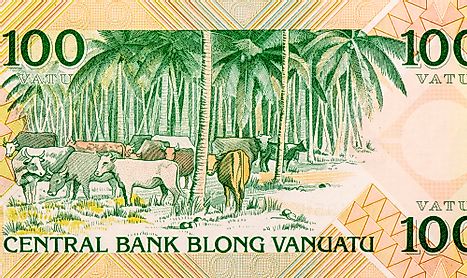 Cattle among palm trees. Portrait from Vanuatu 100 Vatu 1982 Banknotes.