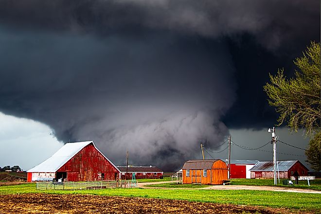 Large tornado passing through a farm between Minden, IA and Harlan, IA