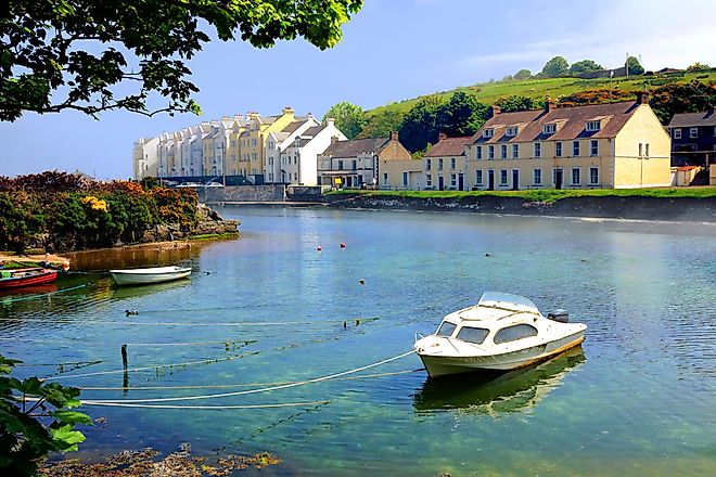 Picturesque harbor with fishing boat in the village of Cushendun, Antrim, Northern Ireland (Credit: JeniFoto via Shutterstock)