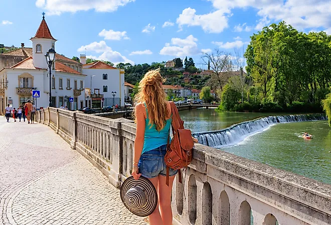 Tourist in the town center of Tomar, Portugal.