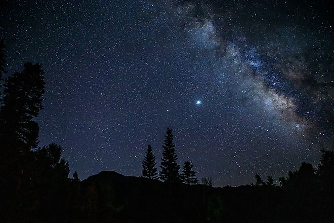 The Milky Way rises above Colorado's San Juan Mountains.