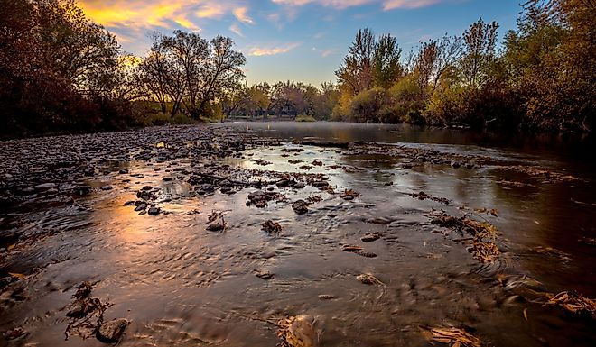 Sunrise and fall leaves on the Boise River near Eagle, Idaho.