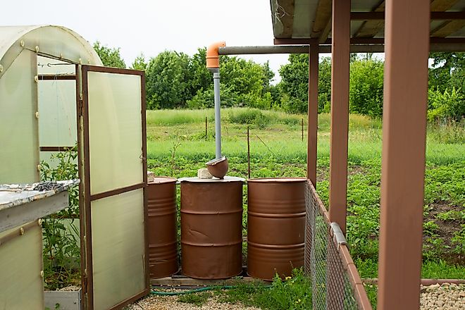 Barrels for collecting rainwater for watering the garden.