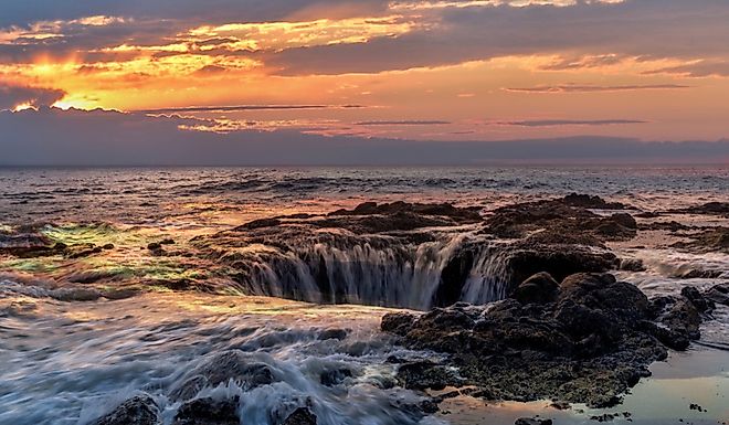 Waves crashing into Thor's Well, Yachats, Oregon.