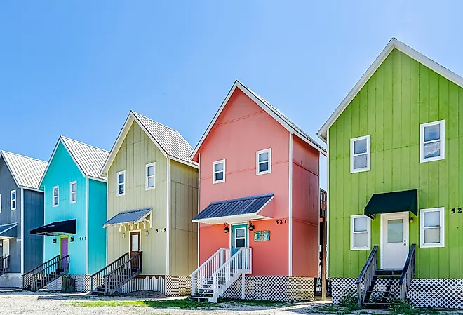 Colorful beach houses along the coast in Dauphin Island, Alabama. Image credit Carmen K. Sisson via Shutterstock