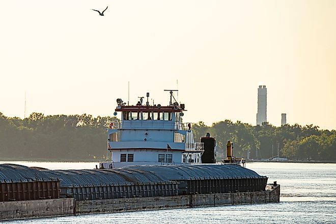 Barge traffic on the Mississippi River at the Melvin Price Locks and Dam Facility near Alton, Illinois