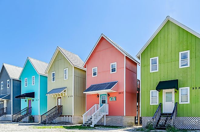 Colorful beach houses along the coast in Dauphin Island, Alabama. Image credit Carmen K. Sisson via Shutterstock